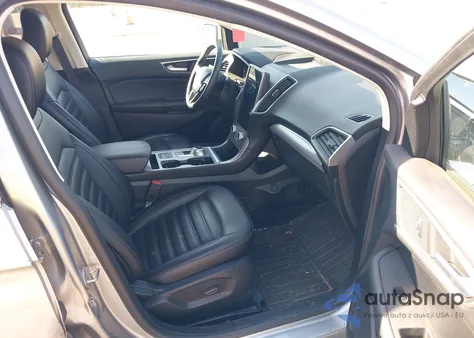 2021 Ford Edge Sel z USA, uszkodzony, nr VIN 2FMPK4J91MBA44134